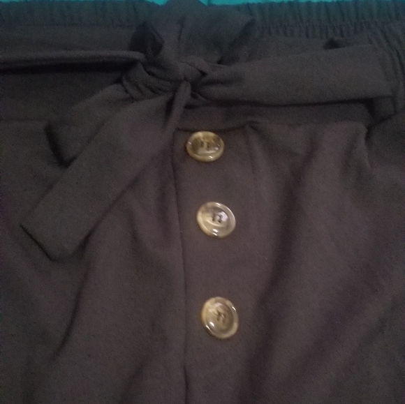 Black stretch belted pants. - Picture 4 of 5